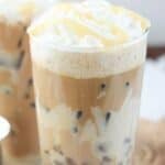 Two glasses of copycat Starbucks iced white chocolate mocha drinks.