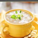 Homemade Sweet Tomatoes clam chowder and oyster crackers on a plate.