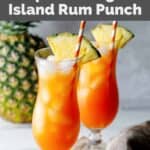 Homemade TGI Friday's Captain Morgan island rum punch in hurricane glasses.