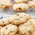Homemade Keebler pecan sandies cookies on a plate and wire rack.