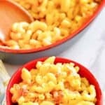 Homemade Luby's mac and cheese in a pot and small bowl.