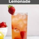 Homemade Red Robin freckled lemonade, strawberries, and lemon wedge.
