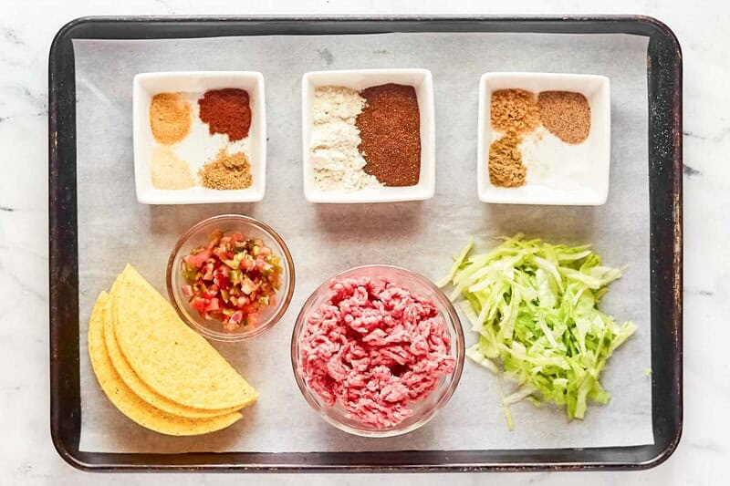 Copycat taco bell fresco taco ingredients on a tray.