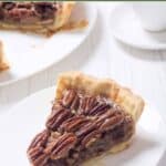 Homemade Taste of Texas pecan pie slice on a dessert plate.