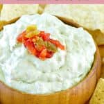 Homemade Casa Ole green sauce in a small wood bowl.