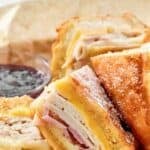 Homemade Cheddar's monte cristo sandwich in a serving basket.