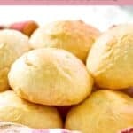 Homemade golden corral dinner rolls piled in a serving basket.