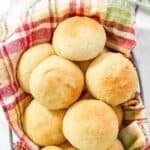 Homemade golden corral dinner rolls in a serving basket.