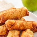 Homemade Panda Express apple pie egg rolls piled on a plate.