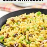 A bowl of Rice-A-Roni artichoke rice salad with curry in a serving bowl.