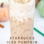 Homemade Starbucks iced pumpkin cream chai latte garnished with pumpkin pie spice.