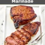 Steaks made with homemade steak and ale kensington club marinade and a meat fork.