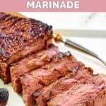 Sliced steak made with homemade steak and ale kensington club marinade on a platter.