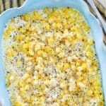 Copycat Rudy's creamed corn in a ceramic baking dish.